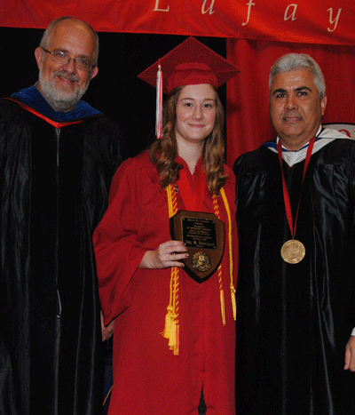Amy Dekerlegand receiving the Spring 2015 David R. Andrew Scholar Award from Dr. Paul Leberg and Dean Ackleh