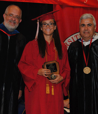 Danielle Alex Dooley receiving the Spring 2015 Dean Duane Blumberg Spirit Award from Dr. Paul Leberg and Dean Ackleh