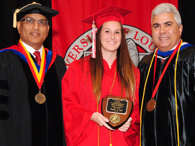 Taylor Kall receiving the Fall 2015 Dr. Sigred Lanoux Service Award from Dr. Durga Poudel and Dean Ackleh