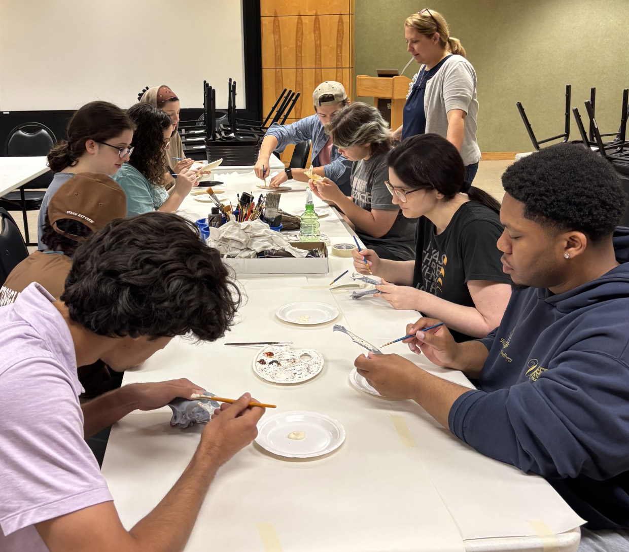Students preparing tooth models for the exhibit