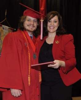 Merlin Dartez Jr. receiving the Fall 2014 Ray P. Authement College of Sciences Outstanding Graduate Award from Alumni Association Representative Celeste Rushing